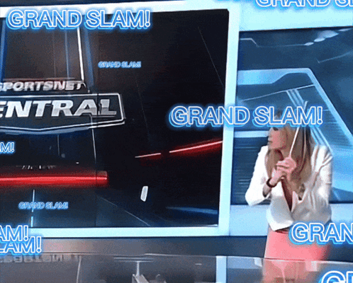 A Woman Stands In Front Of A Screen With The Words Grand Slam On It GIF
