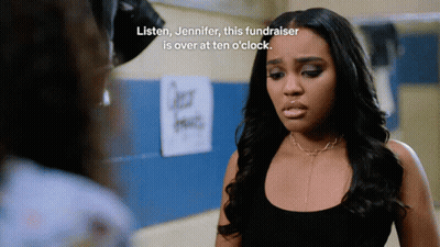 A Woman Stands In Front Of A Sign That Says Listen Jennifer This Fundraiser Is Over At Ten O Clock GIF