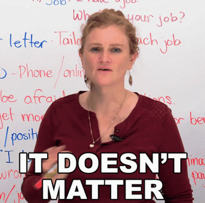 A Woman Stands In Front Of A White Board With The Words It Does N't Matter Written On It GIF