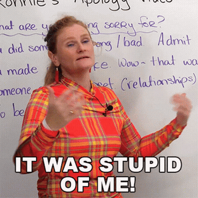 A Woman Stands In Front Of A White Board With The Words It Was Stupid Of Me GIF