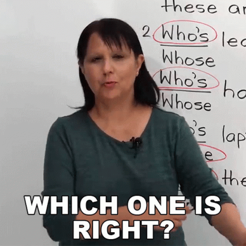A Woman Stands In Front Of A White Board With The Words Which One Is Right GIF