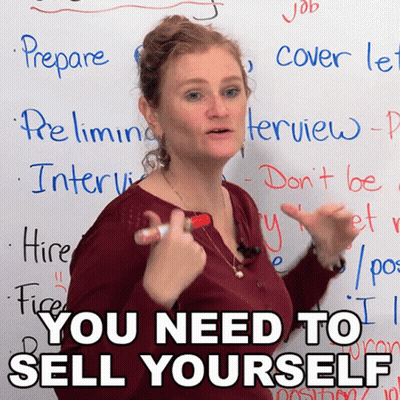 A Woman Stands In Front Of A Whiteboard With The Words You Need To Sell Yourself Written On It GIF