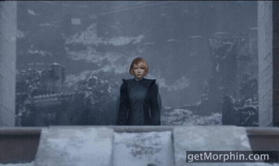 A Woman Stands In Front Of A Window With The Website Getmorphin.com On The Bottom GIF