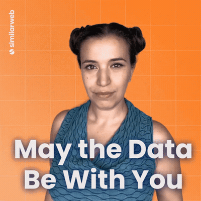 A Woman Stands In Front Of An Orange Background With The Words May The Data Be With You On It GIF