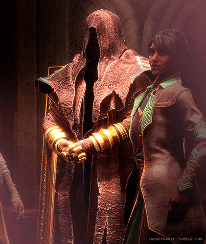 A Woman Stands Next To A Statue Of A Man With A Hood And The Words Eurodynamic.tumblr.com On The Bottom Right GIF