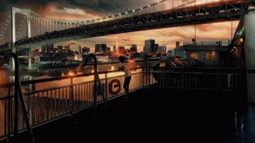 A Woman Stands On A Balcony Overlooking A Bridge That Has The Word Ncis On It GIF