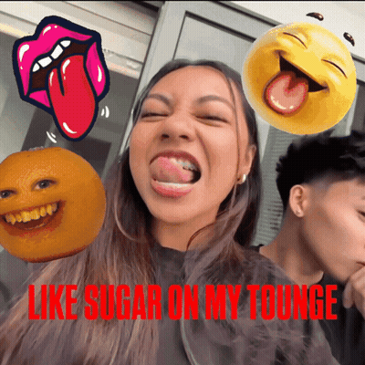 A Woman Sticking Her Tongue Out With The Words Like Sugar On My Tounge Written Below Her GIF