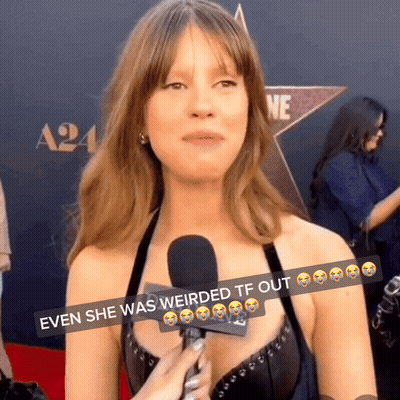 A Woman Talking Into A Microphone With The Words " Even She Was Weirded Tf Out " GIF