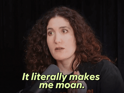 A Woman Talking Into A Microphone With The Words It Literally Makes Me Moan GIF