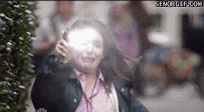A Woman Talking On A Cell Phone With A Senorgif.com Watermark On The Bottom GIF