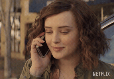 A Woman Talking On A Cell Phone With Netflix Written On The Bottom GIF