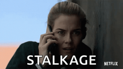 A Woman Talking On A Cell Phone With Stalkage Netflix Written Below Her GIF