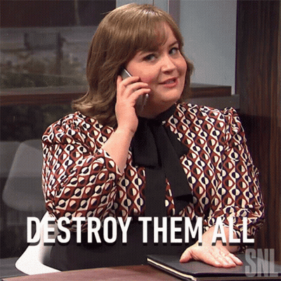 A Woman Talking On A Cell Phone With The Words " Destroy Them All " Above Her GIF