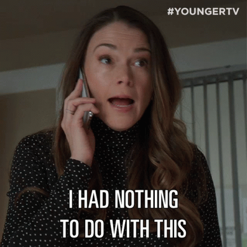 A Woman Talking On A Cell Phone With The Words I Had Nothing To Do With This Below Her GIF