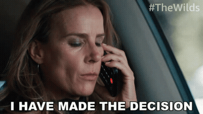 A Woman Talking On A Cell Phone With The Words " I Have Made The Decision " Above Her GIF