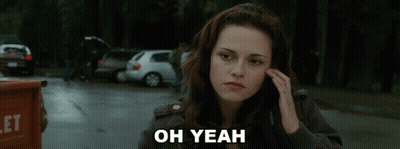 A Woman Talking On A Cell Phone With The Words Oh Yeah Written On The Bottom GIF