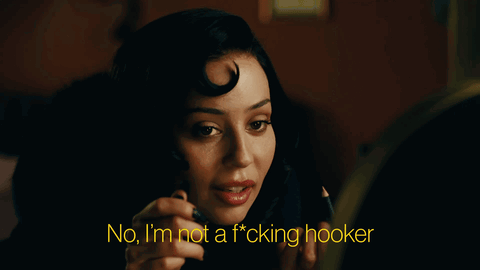 A Woman Talking On A Phone With The Words No I 'M Not A F * Cking Hooker GIF