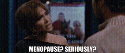 A Woman Talking To A Man With The Words Menopause Seriously GIF