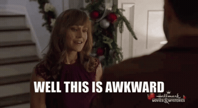 A Woman Talking To A Man With The Words Well This Is Awkward On The Bottom GIF