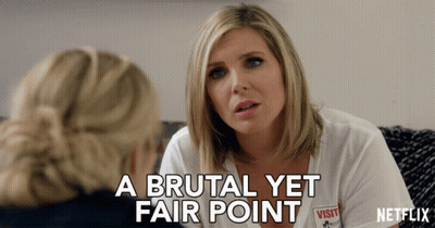 A Woman Talking To Another Woman With The Words " A Brutal Yet Fair Point " Below Her GIF