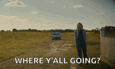 A Woman Walking Down A Dirt Road With The Words " Where Y'all Going " Behind Her GIF