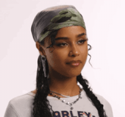 A Woman Wearing A Bandana And A Shirt That Says Harley On It GIF