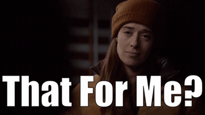 A Woman Wearing A Beanie And A Jacket Is Asking That For Me GIF