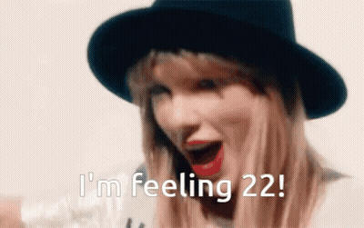 A Woman Wearing A Black Hat Is Saying I 'M Feeling 22 GIF