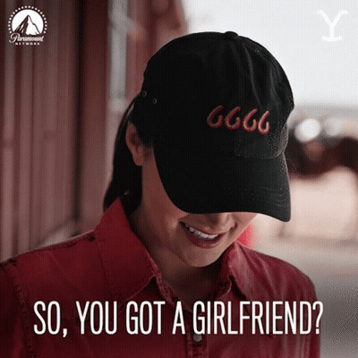 A Woman Wearing A Black Hat With 666 On It GIF