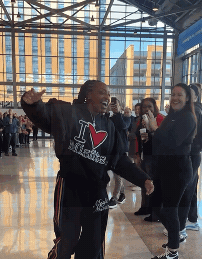 A Woman Wearing A Black Hoodie That Says I Love Misfits GIF