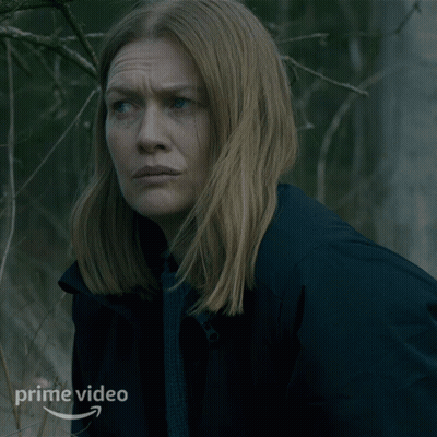 A Woman Wearing A Black Jacket With The Word Prime Video On It GIF