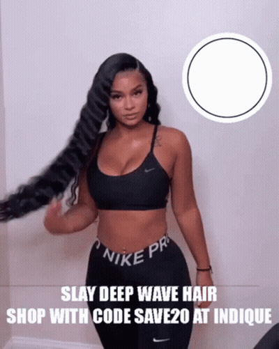 A Woman Wearing A Black Nike Pro Bra And Pants GIF