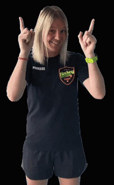 A Woman Wearing A Black Princess Hockey Shirt GIF