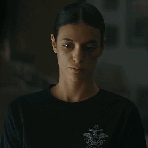 A Woman Wearing A Black Shirt Says I Just Stopped Caring GIF
