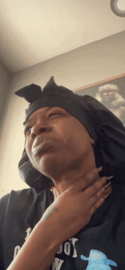 A Woman Wearing A Black Shirt That Says Cowboys On It GIF