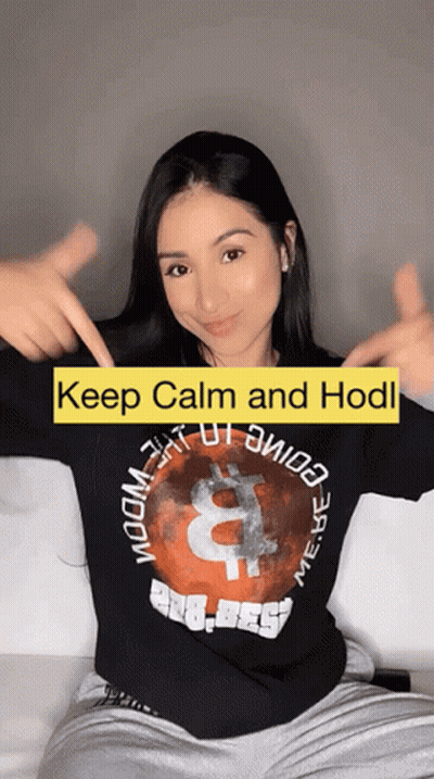 A Woman Wearing A Black Shirt That Says " Keep Calm And Hodl " GIF
