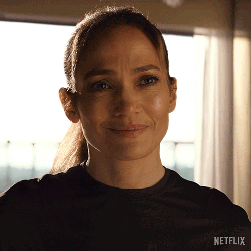 Woman Wearing Black Shirt With Netflix Logo GIF
