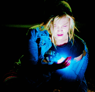 A Woman Wearing A Black Shirt That Says ' Sick - Ii ' On It GIF