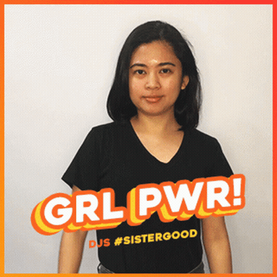 A Woman Wearing A Black Shirt With Grl Pwr Written On It GIF