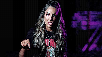 A Woman Wearing A Black T-Shirt That Says One On It GIF