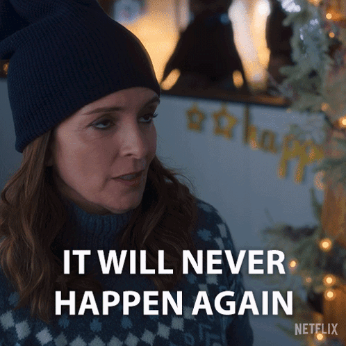 A Woman Wearing A Blue Beanie And Sweater Says It Will Never Happen Again GIF