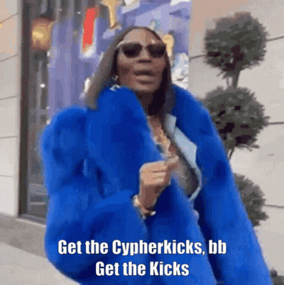 A Woman Wearing A Blue Fur Coat And Sunglasses Says Get The Cypherkicks , Bb Get The Kicks . GIF