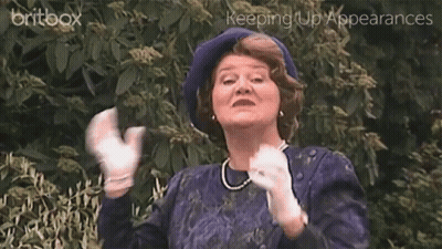 A Woman Wearing A Blue Hat And White Gloves With The Words Keeping Up Appearances On The Bottom GIF