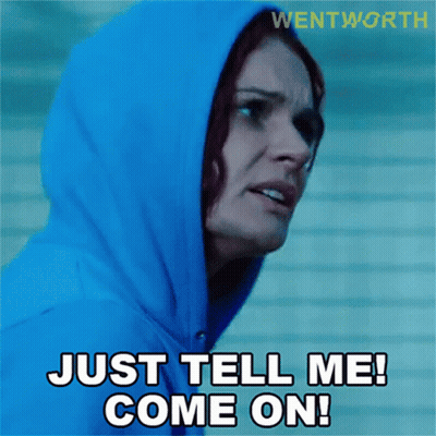 A Woman Wearing A Blue Hoodie Says " Just Tell Me Come On " GIF