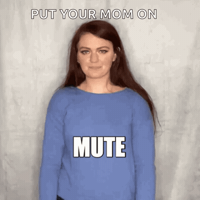 A Woman Wearing A Blue Sweater With The Words Put Your Mom On Mute GIF