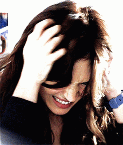A Woman Wearing A Blue Watch Is Holding Her Hair GIF