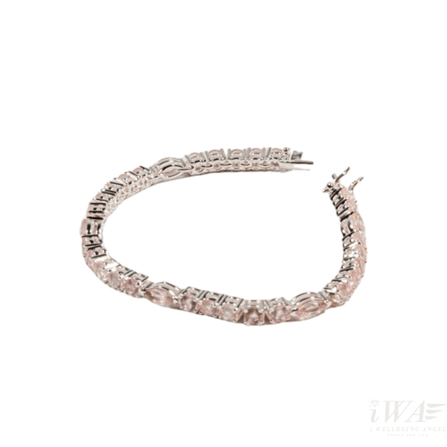 A Woman Wearing A Bracelet And A Ring With Iwae Written On The Bottom GIF