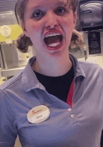 A Woman Wearing A Chick-Fil-A Shirt Has A Name Tag That Says Gina GIF
