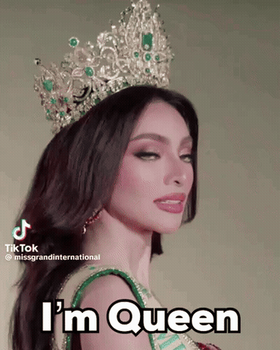 A Woman Wearing A Crown That Says I 'M Queen On It GIF