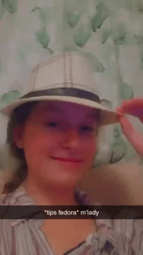A Woman Wearing A Fedora Hat With A Caption That Says Tips Fedora M Lady GIF
